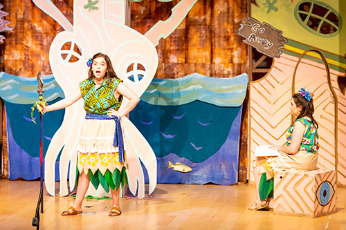 Actors perform a scene from the Children's Opera production of 