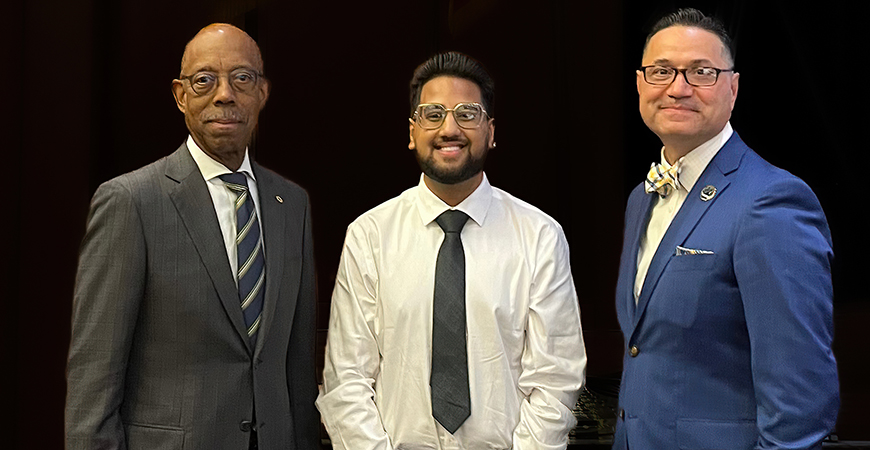 Three males standing