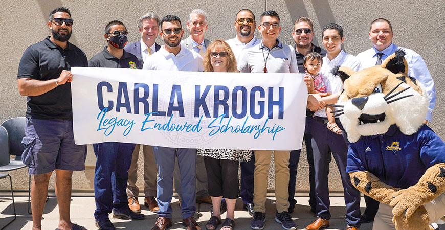 A group of university alumni and Omega Delta Phi fraternity members have established the Carla Krogh Legacy Endowed Scholarship.